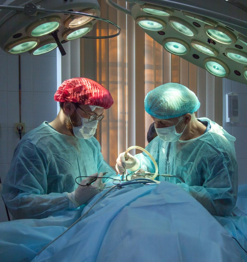Surgical team in an operating theatre representing treatment of injury types