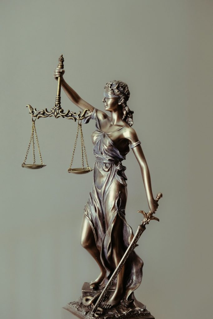 Statue of the scales of justice representing inheritance act claims